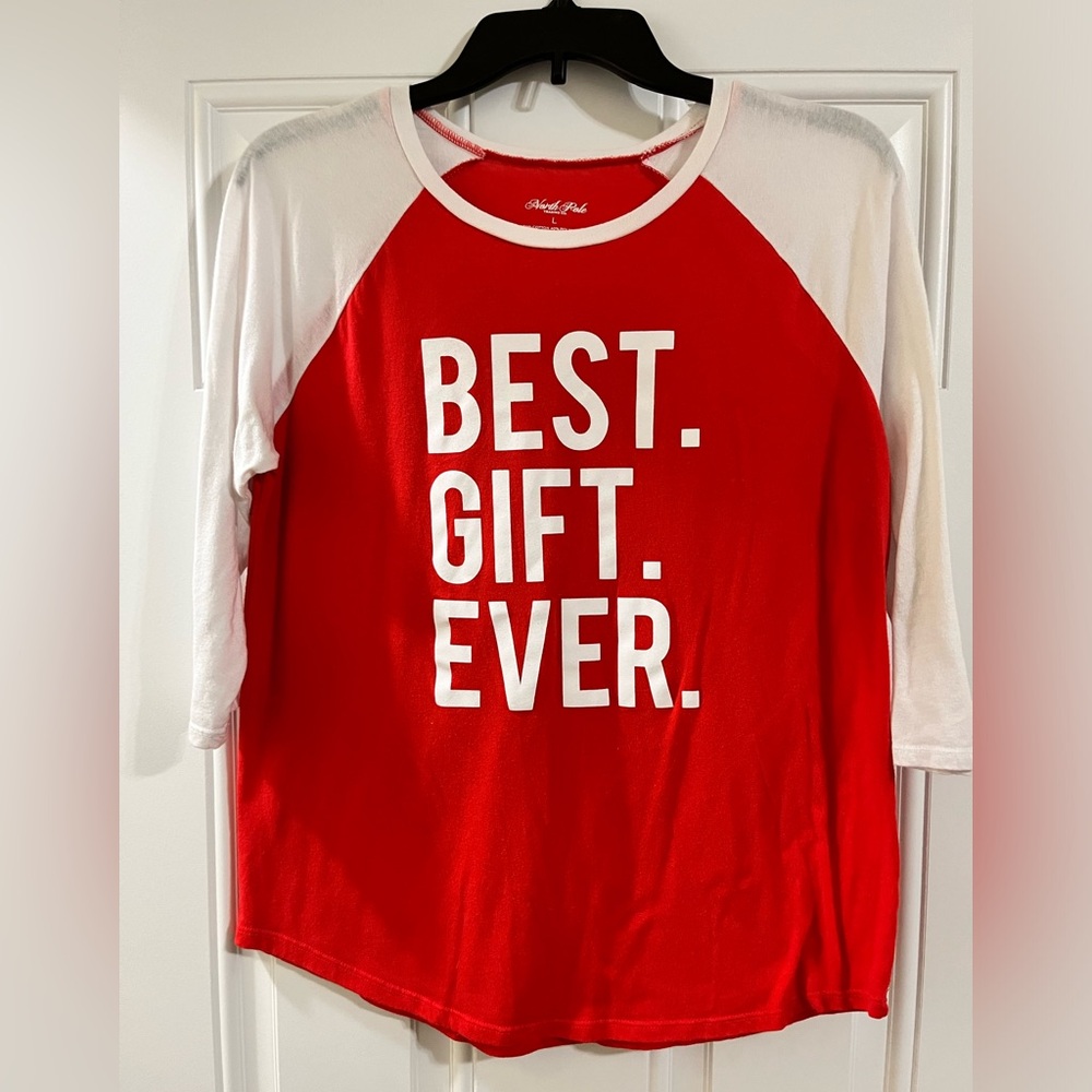 Red and white holiday shirt. Soft, lightweight shirt with 3/4 length sleeves.